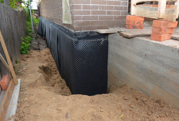 Happy homeowners after waterproofing job in Chadds Ford